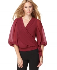 Get a fresh feminine look with this blouse from Studio M. Flowing and lightweight, it's the perfect match for everything from black pants to pencil skirts. Get a fresh feminine look with this blouse from Studio M. Flowing and lightweight, it's the perfect match for everything from black pants to pencil skirts.