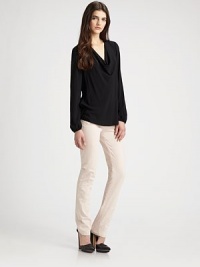 Long bishop sleeves accentuate this slightly slouched cowlneck. CowlneckLong bishop sleevesLong sleevesRibbed cuffsLonger length hits below the hipsRayonDry cleanImported of Italian fabric