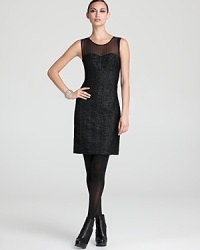 Demure yet dramatic, this DKNY dress shimmers with an embossed floral motif for an effortlessly romantic style. A sheer yoke and curve-skimming silhouette imbue the look with feminine intrigue. Demure yet dramatic, this DKNY dress shimmers with an embossed floral motif for an effortlessly romantic style. A sheer yoke and curve-skimming silhouette imbue the look with feminine intrigue.