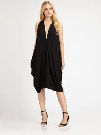 Add a boost of drama to your outfit with this modern, over-sized caftan featuring sexy cut-out shoulders and a plunging neckline. Plunging V neckCenter pleating detailCut-out shouldersDraped sides for a loose fitInverted hemAbout 35 from shoulder to hem92% modal/8% spandexDry cleanMade in USAModel shown is 5'9 (176cm) wearing US size Small. Add a boost of drama to your outfit with this modern, over-sized caftan featuring sexy cut-out shoulders and a plunging neckline. Plunging V neckCenter pleating detailCut-out shouldersDraped sides for a loose fitInverted hemAbout 35 from shoulder to hem92% modal/8% spandexDry cleanMade in USAModel shown is 5'9 (176cm) wearing US size Small.