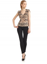 THE LOOKIntricate embroidered designSemi-sheer constructionV-neckFront snap closureCap sleeves with gentle ruchingTHE FITAbout 24 from shoulder to hemTHE MATERIALNylonSilk liningCARE & ORIGINDry cleanMade in ItalyModel shown is 5'10½ (179cm) wearing US size 4. THE LOOKIntricate embroidered designSemi-sheer constructionV-neckFront snap closureCap sleeves with gentle ruchingTHE FITAbout 24 from shoulder to hemTHE MATERIALNylonSilk liningCARE & ORIGINDry cleanMade in ItalyModel shown is 5'10½ (179cm) wearing US size 4.