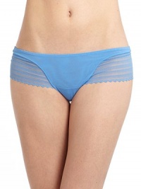 THE LOOKElastic waistMesh middle panelOpen weave lace hipster detailsFrench cut lace back THE MATERIAL94% nylon/6% spandexPartially linedCARE & ORIGINMachine washImported THE LOOKElastic waistMesh middle panelOpen weave lace hipster detailsFrench cut lace back THE MATERIAL94% nylon/6% spandexPartially linedCARE & ORIGINMachine washImported