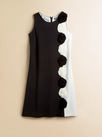 A sleeveless shift dress gets a groovy update in a 60's-inspired, colorblocked design and knit flowers.Round necklineSleevelessBack zipper63% polyester/32% rayon/5% spandexDry cleanImported A sleeveless shift dress gets a groovy update in a 60's-inspired, colorblocked design and knit flowers.Round necklineSleevelessBack zipper63% polyester/32% rayon/5% spandexDry cleanImported