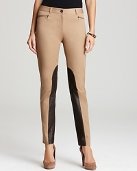 Bullish leather insets lend modern attitude to these skinny Jones New York Collection trousers. Team with nude heels for a striking silhouette. Bullish leather insets lend modern attitude to these skinny Jones New York Collection trousers. Team with nude heels for a striking silhouette.