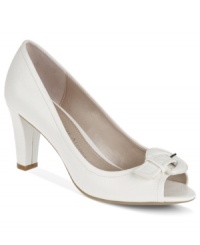 Prim and proper from sunrise to sunset. Etienne's Aigner Day pumps are topped with an elegant buckle at the toe. Prim and proper from sunrise to sunset. Etienne's Aigner Day pumps are topped with an elegant buckle at the toe.
