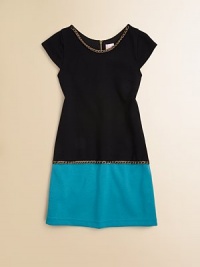 She'll get all wrapped up in this trendy two-tone frock in a ponte shift silhouette with chain piping.ScoopneckShort cap sleevesExposed back zipperFully lined72% rayon/19% nylon/9% spandexDry cleanMade in the USA She'll get all wrapped up in this trendy two-tone frock in a ponte shift silhouette with chain piping.ScoopneckShort cap sleevesExposed back zipperFully lined72% rayon/19% nylon/9% spandexDry cleanMade in the USA