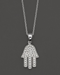 This protective Hamsa pendant is set in pave diamonds and 14 Kt. white gold. This protective Hamsa pendant is set in pave diamonds and 14 Kt. white gold.