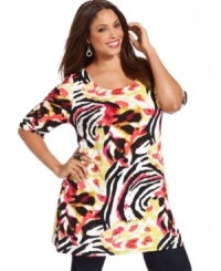 Electrify your legging with Alfani's elbow sleeve plus size tunic top, showcasing a striking print. Electrify your legging with Alfani's elbow sleeve plus size tunic top, showcasing a striking print.