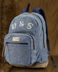 Essential for everyday use, a rugged backpack is crafted from gently worn cotton chambray and accented with a faded logo for a weathered surplus look.