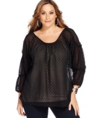 Let your style shine this season with DKNY's three-quarter-sleeve plus size top, finished by a metallic polka-dot patten. Let your style shine this season with DKNY's three-quarter-sleeve plus size top, finished by a metallic polka-dot patten.