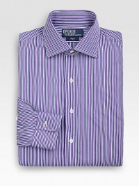 A trim-fitting look in crisp, two-ply cotton with preppy stripes for a refined look. Buttonfront Moderate spread collar Embroidered logo detail Cotton Machine wash Imported 