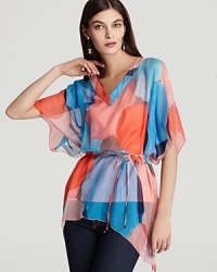 Making the most of the mod moment, this circle-printed BASLER tunic winds around your frame to shape a slim silhouette. Making the most of the mod moment, this circle-printed BASLER tunic winds around your frame to shape a slim silhouette.