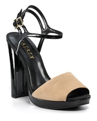 In matte nubuck and glossy patent leathers, the Beatriz platform from Lauren Ralph Lauren hits all the right style notes--color blocking and a block heel fit right in with current footwear trends. In matte nubuck and glossy patent leathers, the Beatriz platform from Lauren Ralph Lauren hits all the right style notes--color blocking and a block heel fit right in with current footwear trends.