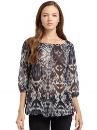 THE LOOKSheer with ikat printRound elastic necklineThree-quarter length elastic cuff sleeves Contrast drawstring hem THE FITAbout 27 from shoulder to hemTHE MATERIALNylonCARE & ORIGINHand washImportedModel shown is 5'9½ (176cm) wearing US size Small. THE LOOKSheer with ikat printRound elastic necklineThree-quarter length elastic cuff sleeves Contrast drawstring hem THE FITAbout 27 from shoulder to hemTHE MATERIALNylonCARE & ORIGINHand washImportedModel shown is 5'9½ (176cm) wearing US size Small.