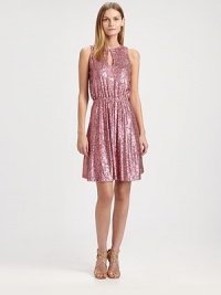Sparkling sequins create a brilliant effect for this keyhole sheath dress with a timeless silhouette.Keyhole necklineSleevelessElasticized waistAllover sequinsFully linedAbout 38 from natural waistPolyesterDry cleanImportedSIZE & FIT Model shown is 5'10½ (179cm) wearing a US size 4. Sparkling sequins create a brilliant effect for this keyhole sheath dress with a timeless silhouette.Keyhole necklineSleevelessElasticized waistAllover sequinsFully linedAbout 38 from natural waistPolyesterDry cleanImportedSIZE & FIT Model shown is 5'10½ (179cm) wearing a US size 4.
