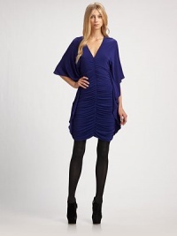 Dramatic, flowing batwing sleeves and allover ruching lend intrigue to this easy-to-wear style.V necklineBatwing sleevesFront and back ruchingBack zipFully linedAbout 21 from natural waist73% acetate/23% nylon/4% spandexHand washMade in USA of imported fabricModel shown is 5'10 (177cm) wearing US size Small. Dramatic, flowing batwing sleeves and allover ruching lend intrigue to this easy-to-wear style.V necklineBatwing sleevesFront and back ruchingBack zipFully linedAbout 21 from natural waist73% acetate/23% nylon/4% spandexHand washMade in USA of imported fabricModel shown is 5'10 (177cm) wearing US size Small.