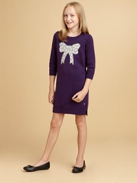 A casually chic sweater dress in a form-fitting silhouette is ultra-girly with a large bow design.CrewneckThree-quarter sleevesPullover styleSide-vented hem60% cotton/22% wool/18% modalDry cleanImported A casually chic sweater dress in a form-fitting silhouette is ultra-girly with a large bow design.CrewneckThree-quarter sleevesPullover styleSide-vented hem60% cotton/22% wool/18% modalDry cleanImported