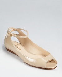 Seemingly a classic peep toe from the front, the Fern Demi Wedge surprises from the back with a cutout detail at the heel. From Delman. Seemingly a classic peep toe from the front, the Fern Demi Wedge surprises from the back with a cutout detail at the heel. From Delman.