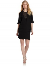 THE LOOKRound necklineShort dolman sleeves with shoulder cutoutsSheer mesh bib with bead and rhinestone detailsBack button closure with keyholeTHE FITAbout 34 from shoulder to hemTHE MATERIAL97% polyester/3% spandexFully linedCARE & ORIGINDry cleanImportedModel shown is 5'9 (175cm) wearing US size Small. THE LOOKRound necklineShort dolman sleeves with shoulder cutoutsSheer mesh bib with bead and rhinestone detailsBack button closure with keyholeTHE FITAbout 34 from shoulder to hemTHE MATERIAL97% polyester/3% spandexFully linedCARE & ORIGINDry cleanImportedModel shown is 5'9 (175cm) wearing US size Small.