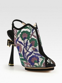 A lacquered bow completes this on-trend ankle boot, featuring metallic embroidered mesh paired with suede trim. Lacquered heel, 4½ (115mm)Lacquered island platform, ½ (15mm)Compares to a 4 heel (100mm)Metallic embroidered mesh upper with suede trimPeep toeElasticized suede slingback strapLeather lining and solePadded insoleMade in Italy A lacquered bow completes this on-trend ankle boot, featuring metallic embroidered mesh paired with suede trim. Lacquered heel, 4½ (115mm)Lacquered island platform, ½ (15mm)Compares to a 4 heel (100mm)Metallic embroidered mesh upper with suede trimPeep toeElasticized suede slingback strapLeather lining and solePadded insoleMade in Italy