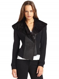 THE LOOKOversized faux fur collarLong sleeves with tab cuff detailDouble-breasted snap frontFaux leather front panelsWaistband with back belt detailTHE FITAbout 20 inches from shoulder to hemTHE MATERIALWoolCARE & ORIGINDry cleanImportedModel shown is 5'11 (178cm) wearing US size Small. THE LOOKOversized faux fur collarLong sleeves with tab cuff detailDouble-breasted snap frontFaux leather front panelsWaistband with back belt detailTHE FITAbout 20 inches from shoulder to hemTHE MATERIALWoolCARE & ORIGINDry cleanImportedModel shown is 5'11 (178cm) wearing US size Small.