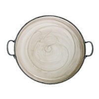 Recalling the distinctive look of Florentine alabaster, carefully mouth-blown glass is swirled with white details and finished with an iridescent glaze to form this striking serveware collection from Arte Italica. Made by hand in Italy, the platter is edged in ornate pewter beading and detailed with sturdy handles. Recalling the distinctive look of Florentine alabaster, carefully mouth-blown glass is swirled with white details and finished with an iridescent glaze to form this striking serveware collection from Arte Italica. Made by hand in Italy, the platter is edged in ornate pewter beading and detailed with sturdy handles.