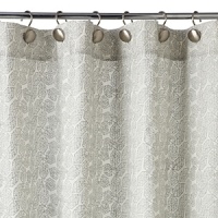 A regal abstract print in metallic gold adds glamour to your bath. A regal abstract print in metallic gold adds glamour to your bath.