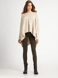 Cable knit adds a touch of texture to this pullover sweater with a relaxed fit and classic ribbed trim.Round neckLong sleevesPull-on styleRibbed trimHi-lo hemAbout 28 from shoulder to hemWool/nylonDry clean Imported Cable knit adds a touch of texture to this pullover sweater with a relaxed fit and classic ribbed trim.Round neckLong sleevesPull-on styleRibbed trimHi-lo hemAbout 28 from shoulder to hemWool/nylonDry clean Imported