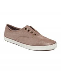 Make your casual looks so much cuter. American Rag glams up the classic canvas sneaker by Keds with a metallic finish on their easy, slip-on silhouette. Make your casual looks so much cuter. American Rag glams up the classic canvas sneaker by Keds with a metallic finish on their easy, slip-on silhouette.