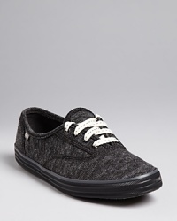 Like your favorite tee, these heathered Keds Champion sneakers wear well with jeans and leggings alike. The darker color makes them a perfect cool-weather pick. Like your favorite tee, these heathered Keds Champion sneakers wear well with jeans and leggings alike. The darker color makes them a perfect cool-weather pick.