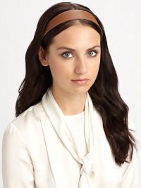 A classic design with a comfortable elastic back. LeatherMade in USA of imported fabrics A classic design with a comfortable elastic back. LeatherMade in USA of imported fabrics