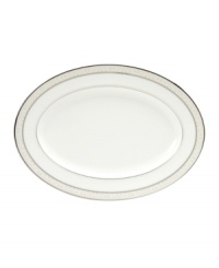 This versatile and stylish oval platter will coordinate perfectly with a variety of table linens and flatware. An ornate scroll motif trimmed in platinum adds a sophisticated sensibility to your tabletop. This versatile and stylish oval platter will coordinate perfectly with a variety of table linens and flatware. An ornate scroll motif trimmed in platinum adds a sophisticated sensibility to your tabletop.