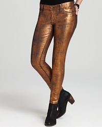 Flaunting metallic bronze, these Current/Elliott jeans illuminate the night for the season's hautest trend. Flaunting metallic bronze, these Current/Elliott jeans illuminate the night for the season's hautest trend.