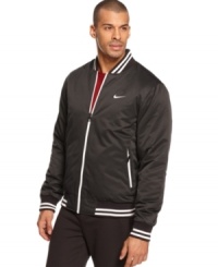 Keep your sporty style doing double time with this reversible jacket from Nike. Keep your sporty style doing double time with this reversible jacket from Nike.
