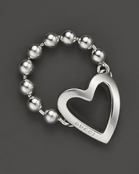 Engraved with logo text, a cutout heart adorns a beaded ring band. From Gucci. Engraved with logo text, a cutout heart adorns a beaded ring band. From Gucci.