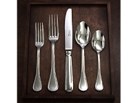 Couzon flatware bears the French Quality One symbol, the highest European standard. Wide teardrop handles and refined shape grace any setting with elegance and high style . Forged from 18/10 stainless steel, each piece is hand-polished. Crafted in full European size. 5 Piece Place Setting includes:Salad Fork , Place Fork ,Place Knife , Soup Spoon and Teaspoon.