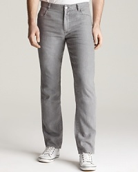 The modern slim fit of these pants from Michael Kors balances the relaxed linen material for a casual cool, always-comfortable look.