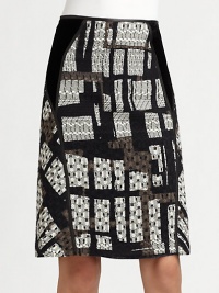 Textural, geometrically-patterned tweed and supple leather piping define this chic design.Panel constructionLeather pipingConcealed back zipAbout 25 long83% wool/17% polyamideDry cleanMade in ItalyModel shown is 5'11 (180cm) wearing US size 4. Textural, geometrically-patterned tweed and supple leather piping define this chic design.Panel constructionLeather pipingConcealed back zipAbout 25 long83% wool/17% polyamideDry cleanMade in ItalyModel shown is 5'11 (180cm) wearing US size 4.