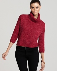 Exclusive to Bloomingdale's, this cropped Theory turtleneck gets added cool from a triangular cutout at the back hem for a forward fall. Exclusive to Bloomingdale's, this cropped Theory turtleneck gets added cool from a triangular cutout at the back hem for a forward fall.