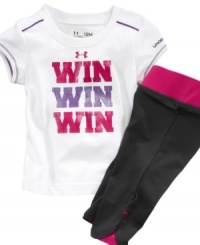 The message here is clear, win win win! This cute Under Armour tee and pants set will have her looking like a champ. The message here is clear, win win win! This cute Under Armour tee and pants set will have her looking like a champ.