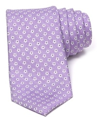 A subtle floral print gets set for spring on this silk and linen tie from The Men's Store at Bloomingdale's. A subtle floral print gets set for spring on this silk and linen tie from The Men's Store at Bloomingdale's.