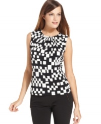 A bold checkered print gives a mod touch to Calvin Klein's essential layering shell. A bold checkered print gives a mod touch to Calvin Klein's essential layering shell.
