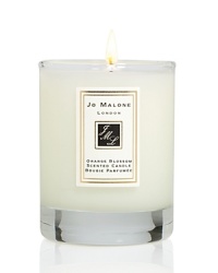 Add the finishing touch to your home by decorating interiors with the refreshingly delicious scent of Orange Blossom. This 60g scented travel candle will help create the perfect ambiance in any room. Fifteen hour burn time. Add the finishing touch to your home by decorating interiors with the refreshingly delicious scent of Orange Blossom. This 60g scented travel candle will help create the perfect ambiance in any room. Fifteen hour burn time.