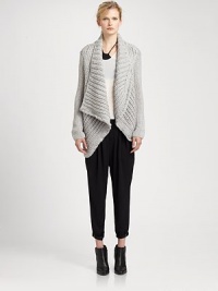 Cropped-back cardigan in a wool-rich blend with an oversized collar and intricate back seaming. Oversized collarDropped shouldersLong sleevesOpen frontCropped back hemAbout 29 from shoulder to hem95% wool/5% polyurethaneDry cleanImportedModel shown is 5'11 (178cm) wearing US size Small. Cropped-back cardigan in a wool-rich blend with an oversized collar and intricate back seaming. Oversized collarDropped shouldersLong sleevesOpen frontCropped back hemAbout 29 from shoulder to hem95% wool/5% polyurethaneDry cleanImportedModel shown is 5'11 (178cm) wearing US size Small.