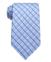 A bold pattern in a cool color palette gives this Tasso Elba tie instant presence. A bold pattern in a cool color palette gives this Tasso Elba tie instant presence.