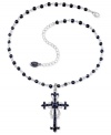Mysterious and sexy, this mixed metal black hematite cross necklace by GUESS is a gorgeous accessory for day or night. Approximate length: 15 inches + 3-inch extender. Approximate drop: 2-1/2 inches.