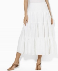 A breezy maxi skirt from Lauren Jeans Co. is rendered with tiers of embroidered cotton, each finished with a varying, delicate pattern. A breezy maxi skirt from Lauren Jeans Co. is rendered with tiers of embroidered cotton, each finished with a varying, delicate pattern.