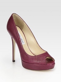 Instantly chic peep toe silhouette of luxe snakeskin with a towering heel and platform. Self-covered heel, 5 (125mm)Covered platform, ¾ (20mm)Compares to a 4¼ heel (110mm)Snakeskin upperPeep toeLeather lining and solePadded insoleMade in Italy Instantly chic peep toe silhouette of luxe snakeskin with a towering heel and platform. Self-covered heel, 5 (125mm)Covered platform, ¾ (20mm)Compares to a 4¼ heel (110mm)Snakeskin upperPeep toeLeather lining and solePadded insoleMade in Italy