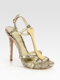 Fronted by a t-strap with goldtone metal plating, this metallic python go-to has an adjustable slingback strap and slight platform. Self-covered heel, 4 (100mm)Covered platform, 1 (25mm)Compares to a 3 heel (75mm)Python upperLeather lining and solePadded insoleMade in ItalyOUR FIT MODEL RECOMMENDS ordering one half size up as this style runs small. Fronted by a t-strap with goldtone metal plating, this metallic python go-to has an adjustable slingback strap and slight platform. Self-covered heel, 4 (100mm)Covered platform, 1 (25mm)Compares to a 3 heel (75mm)Python upperLeather lining and solePadded insoleMade in ItalyOUR FIT MODEL RECOMMENDS ordering one half size up as this style runs small.