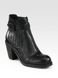 Urban leather staple with a tall stacked heel, adjustable buckle strap and side elastic gores for a casual-cool look. Stacked heel, 3 (75mm)Stacked platform, ½ (15mm)Compares to a 2½ heel (65mm)Leather upper with side elastic goresPull-on style with adjustable ankle strapLeather liningRubber solePadded insoleImported